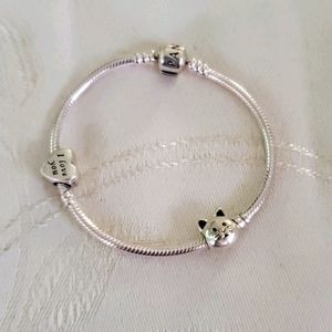 Pandora charm bracelet with 2 charms